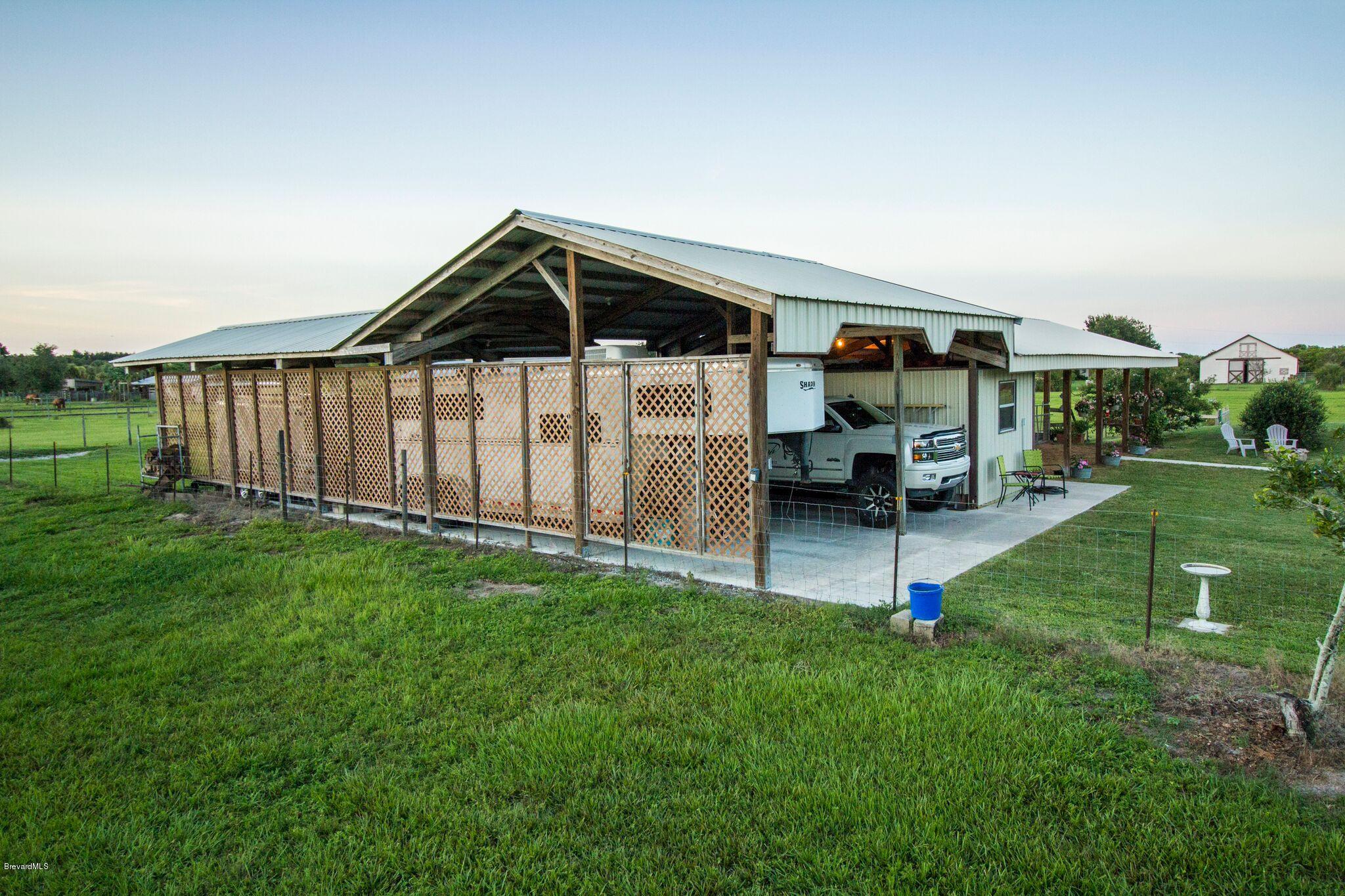 3300 Grandperrin Road Mims, FL 32754 - Photo 20 of 23 3300 pole barn side