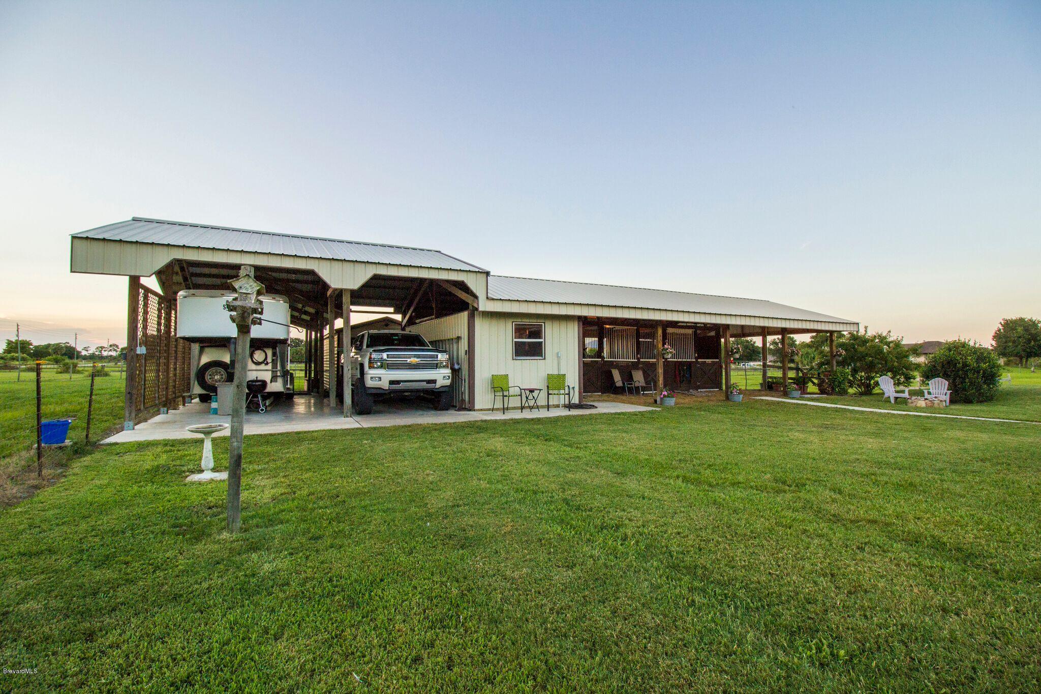 3300 Grandperrin Road Mims, FL 32754 - Photo 23 of 23 3300 barn view