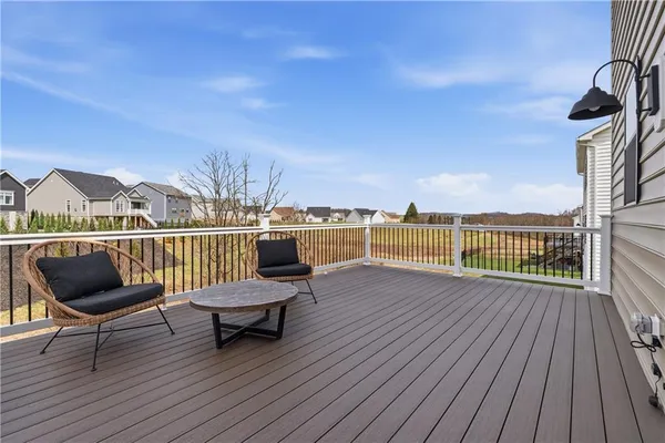 a view of roof deck with patio