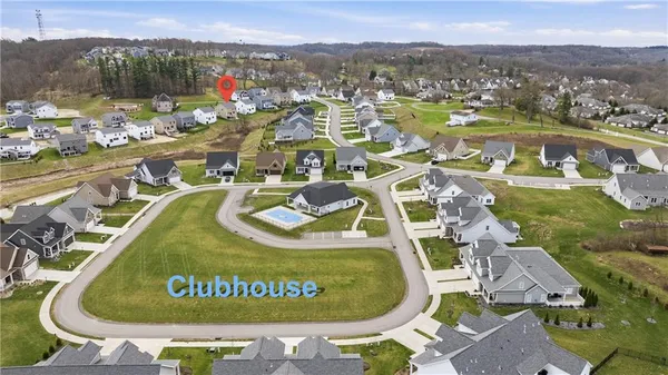 a view of a swimming pool with a yard and mountain view