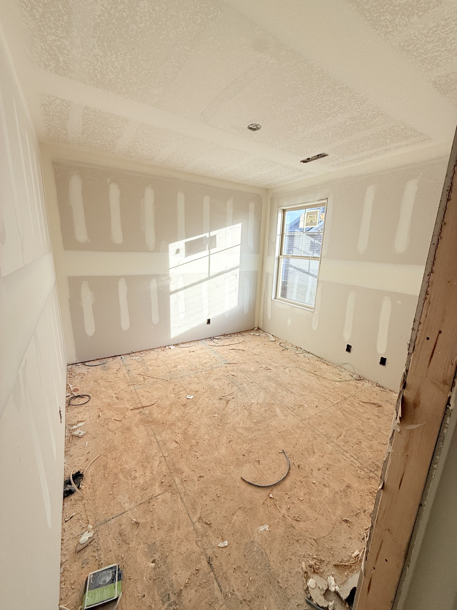 24 Echo Ridge Oak Grove, KY 42262 - Photo 8 of 9 a view of empty room with wooden floor and fan