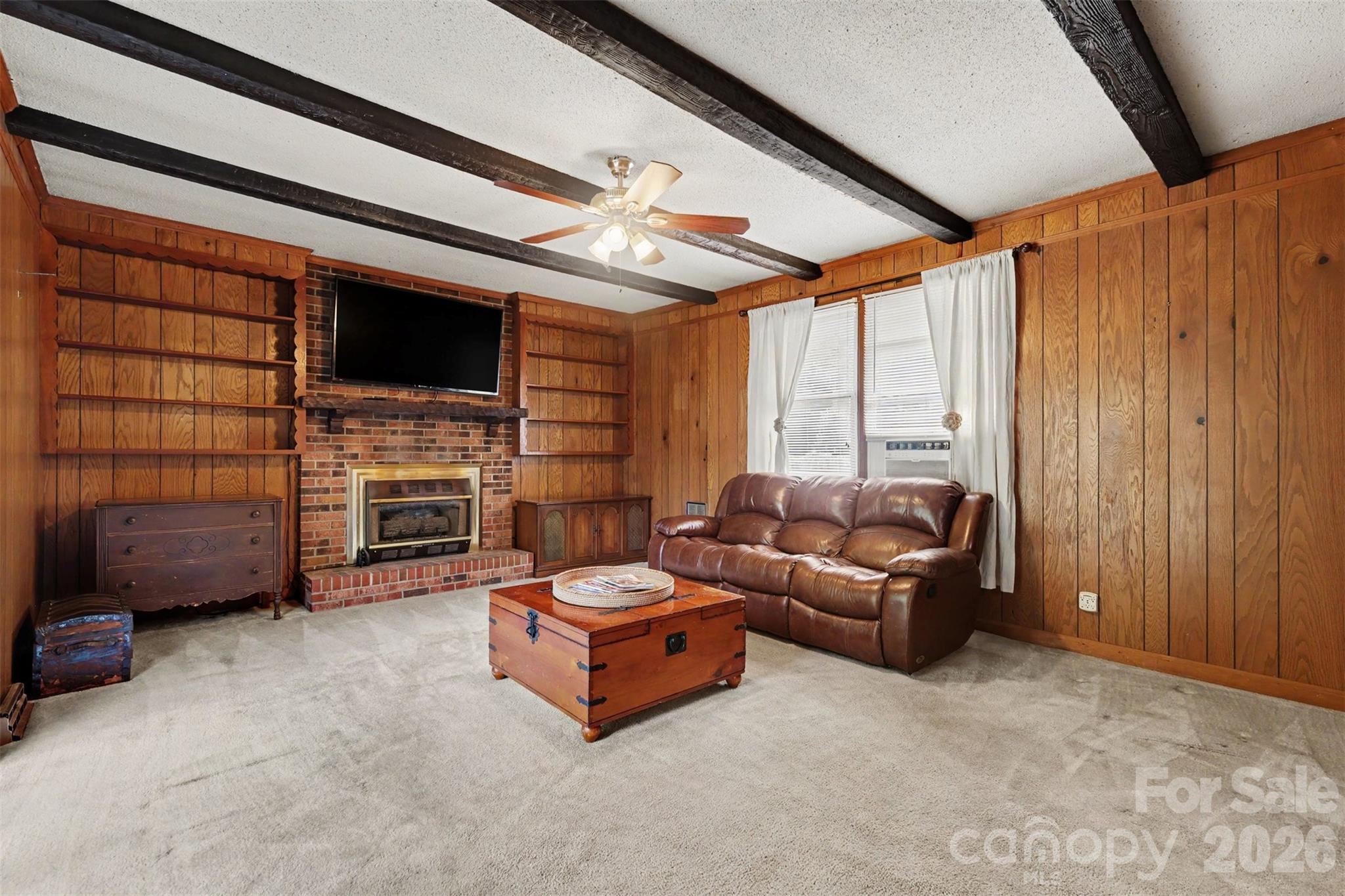 6774 Woodhaven Road Kershaw, SC 29067 - Photo 8 of 30 a living room with furniture and a flat screen tv