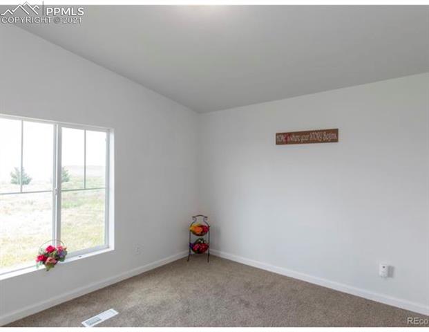36630 Bellemont Road Yoder, CO 80864 - Photo 16 of 17 Bedroom.