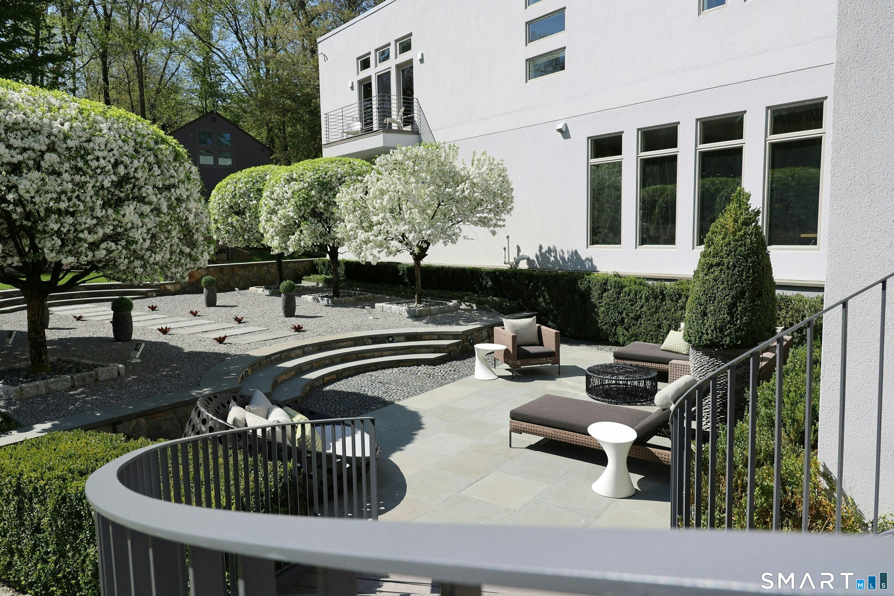 300 Sturges Ridge Road Wilton, CT 06897 - Photo 10 of 40 a front view of house with outdoor seating