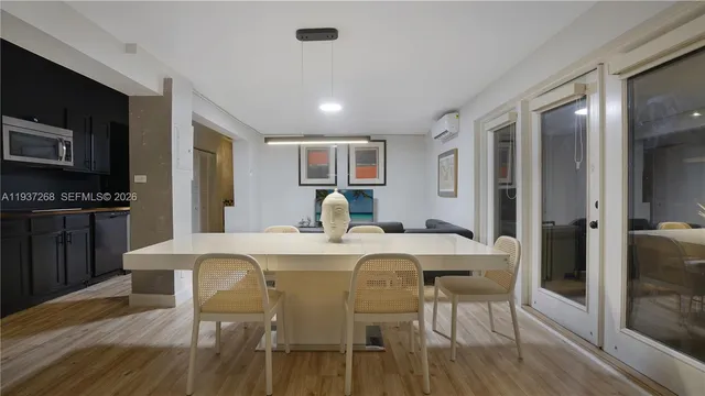 a view of a dining room with furniture