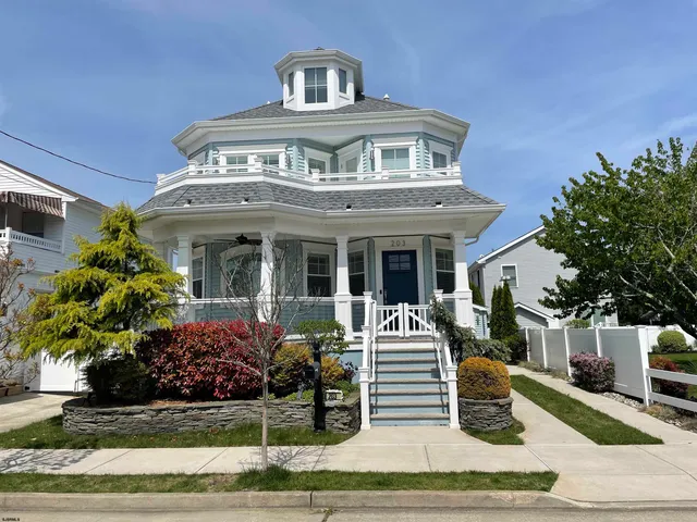 a front view of a house with porch