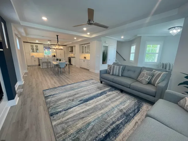 a living room with furniture and a table