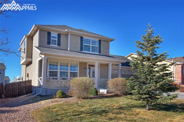9352 St.George Road Peyton, CO 80831 - Photo 2 of 25 5 x 24 covered front porch