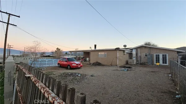 a car parked in front of a house
