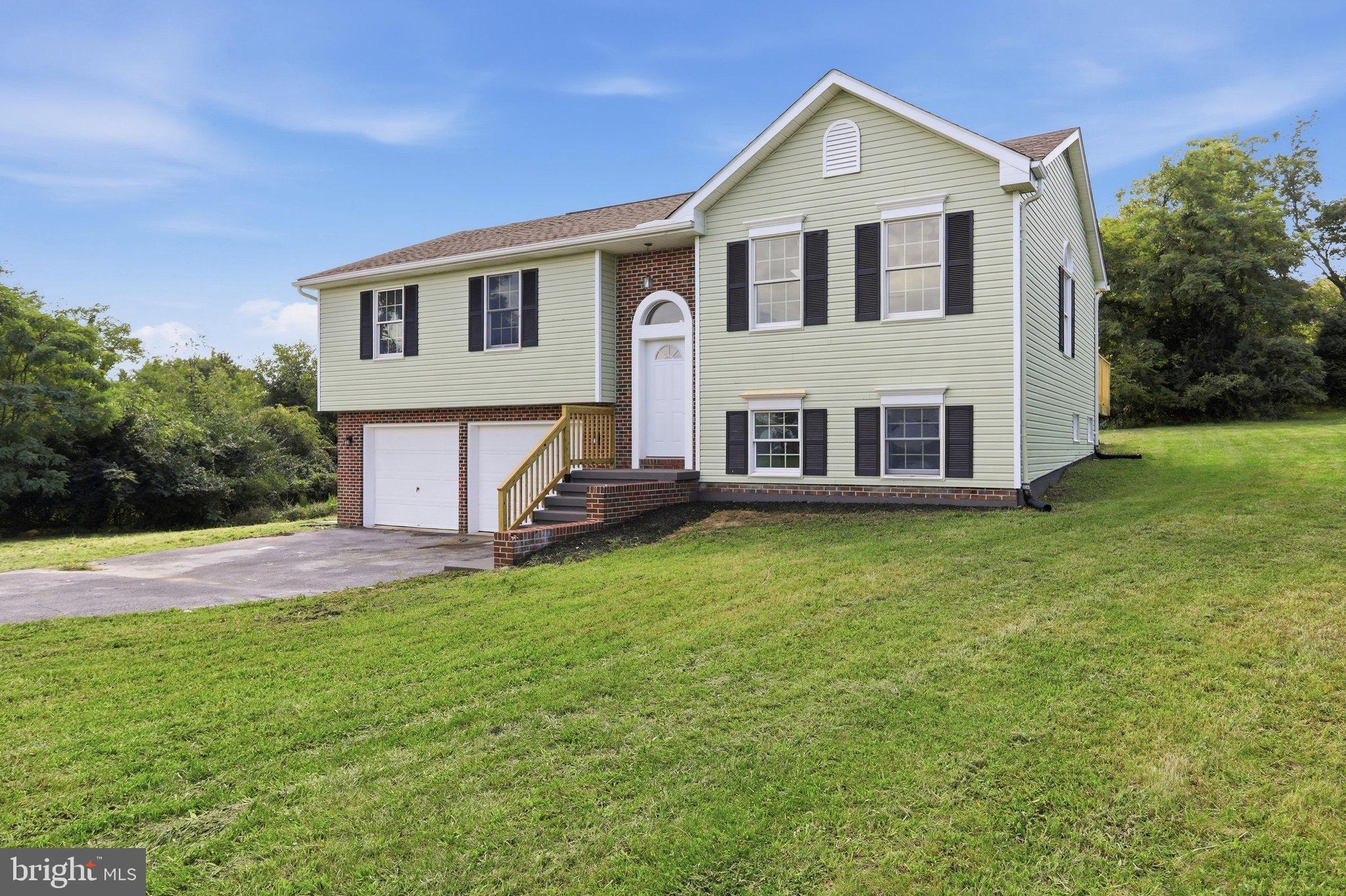 13835 McIntosh Circle Clear Spring, MD 21722 - Photo 2 of 32 Charming home with lush green surroundings.