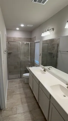 an aerial view of a house with a garden