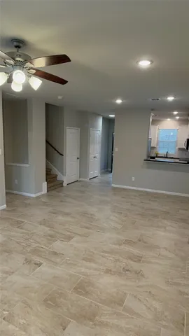 a view of a balcony with two chairs