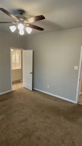 an aerial view of multiple houses with yard