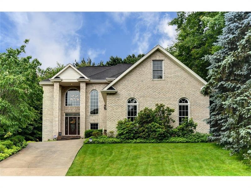 Welcome to your all brick, custom home perched on a private, wooded lot. Gorgeous landscaping, Governor's Drive, and tall 2nd-story windows add to the profile of this stunning home.