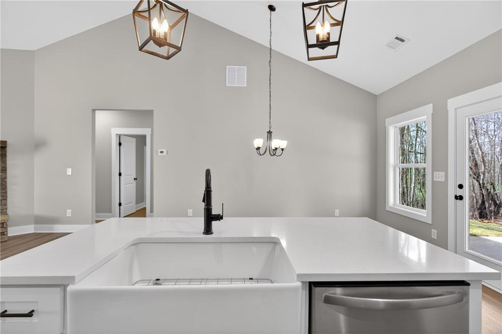 423 Relay Road Silver Creek, GA 30173 - Photo 16 of 48 a bathroom with a sink and a mirror