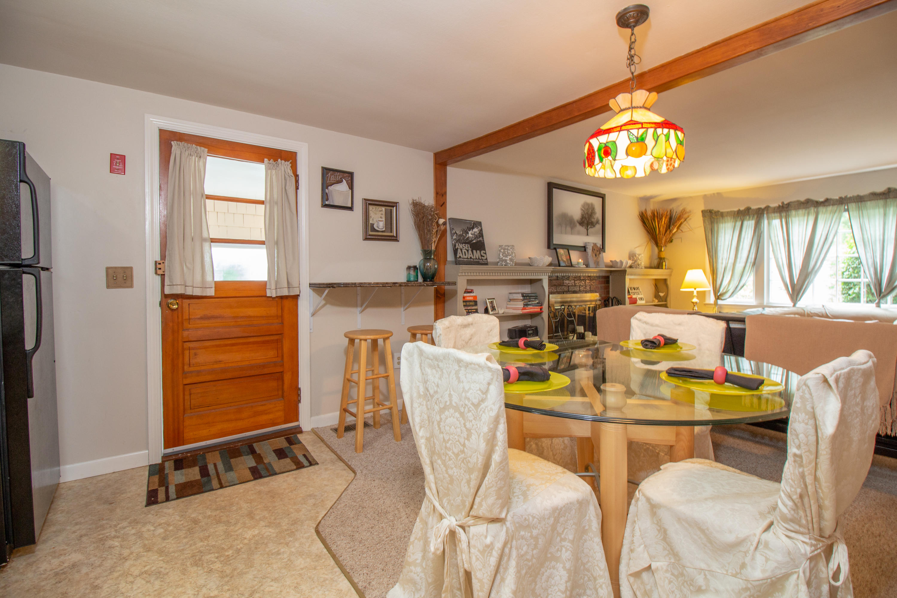 52 Farm Hill Road Centerville, MA 02632 - Photo 13 of 29 a view of a dining room with furniture