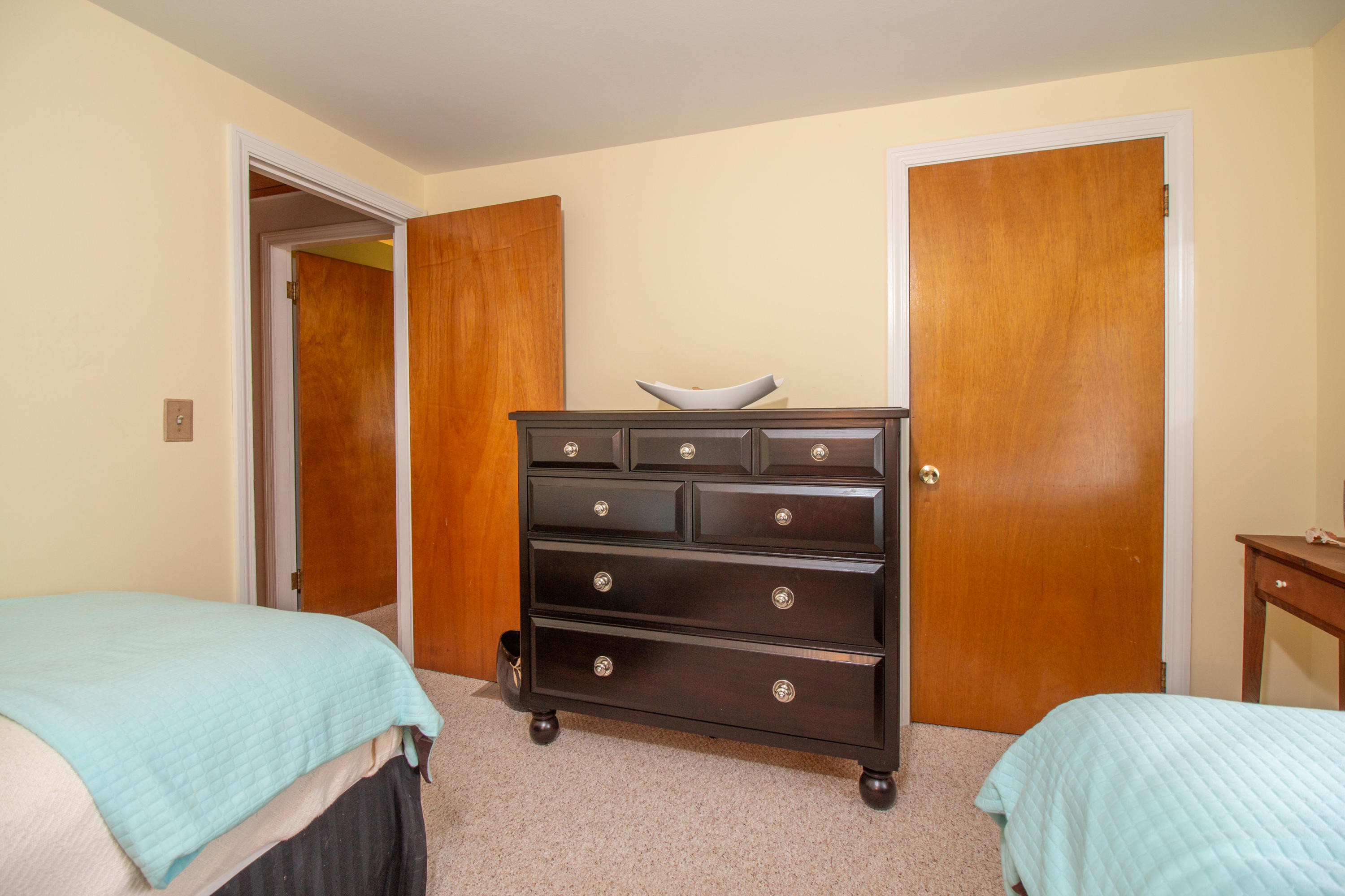 52 Farm Hill Road Centerville, MA 02632 - Photo 19 of 29 a bedroom with a bed and a dresser