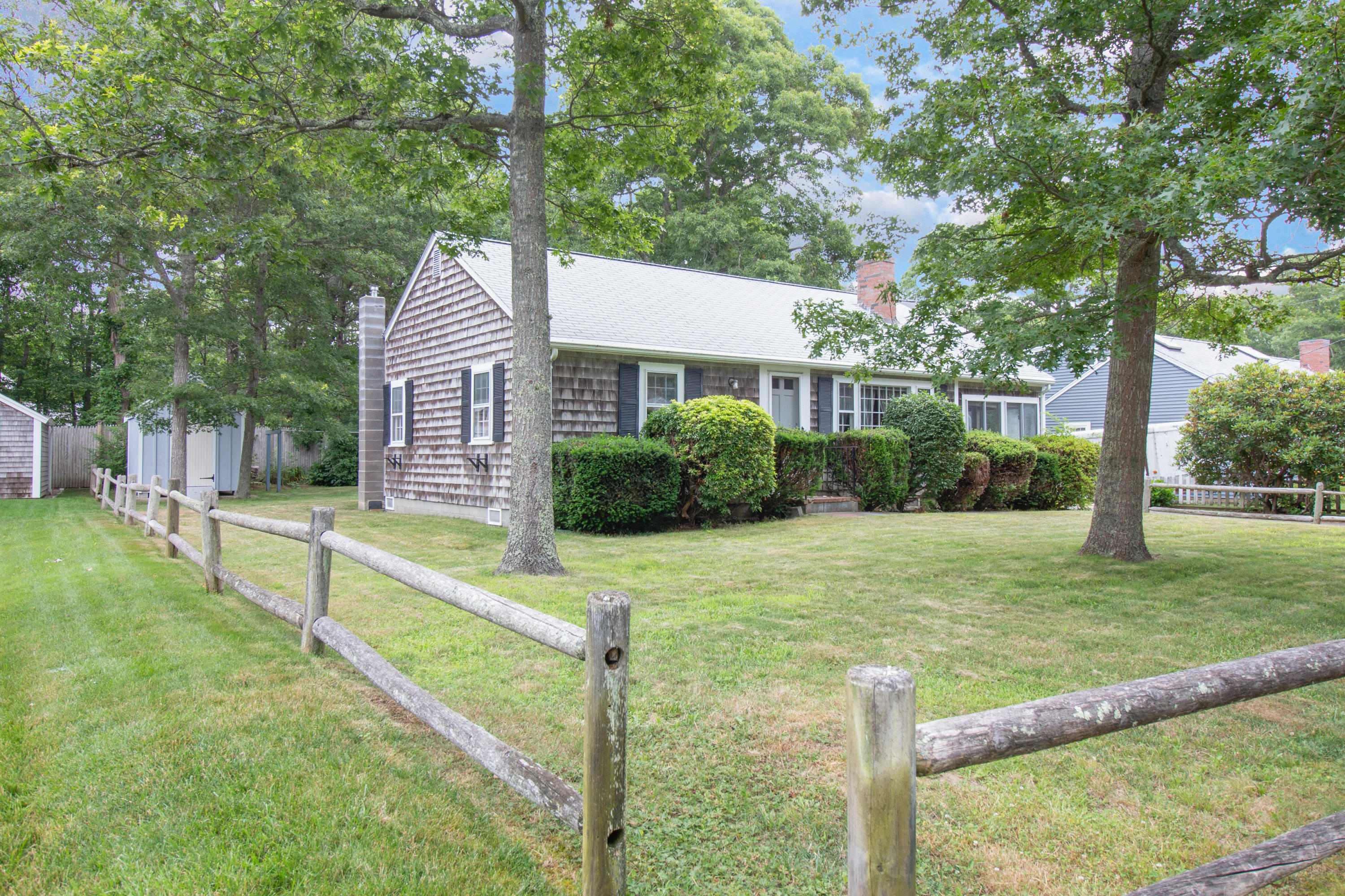 52 Farm Hill Road Centerville, MA 02632 - Photo 2 of 29 a house view with a outdoor space
