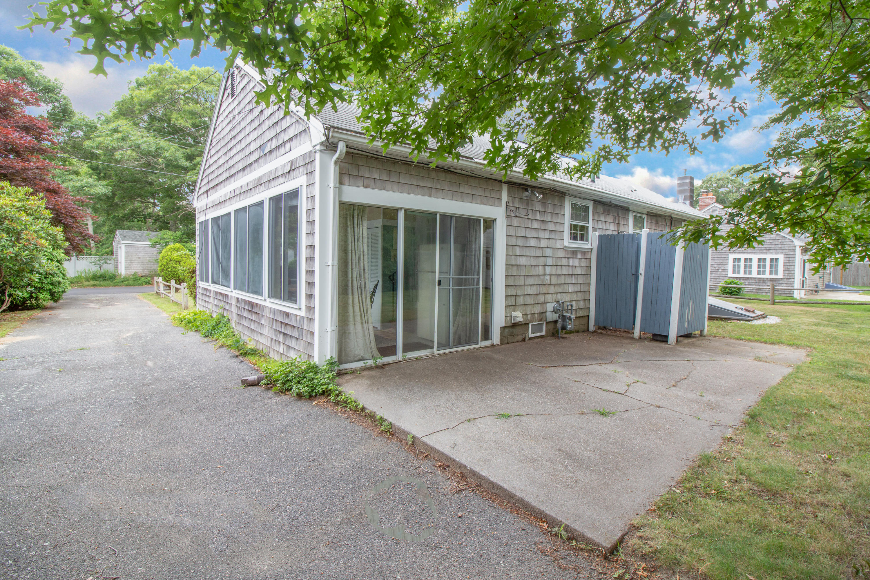 52 Farm Hill Road Centerville, MA 02632 - Photo 23 of 29 a view of a house with a backyard
