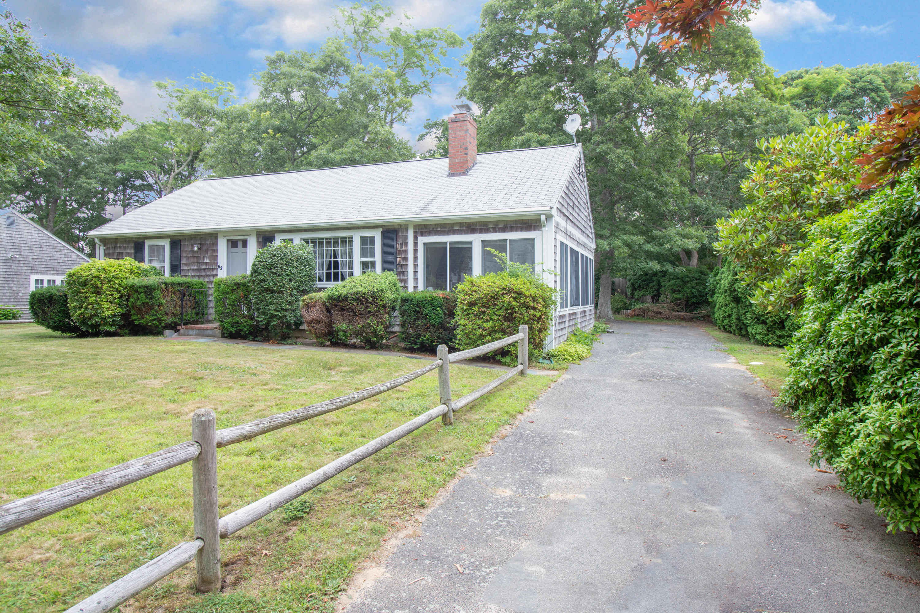 52 Farm Hill Road Centerville, MA 02632 - Photo 4 of 29 a house that has a lot of plants in it