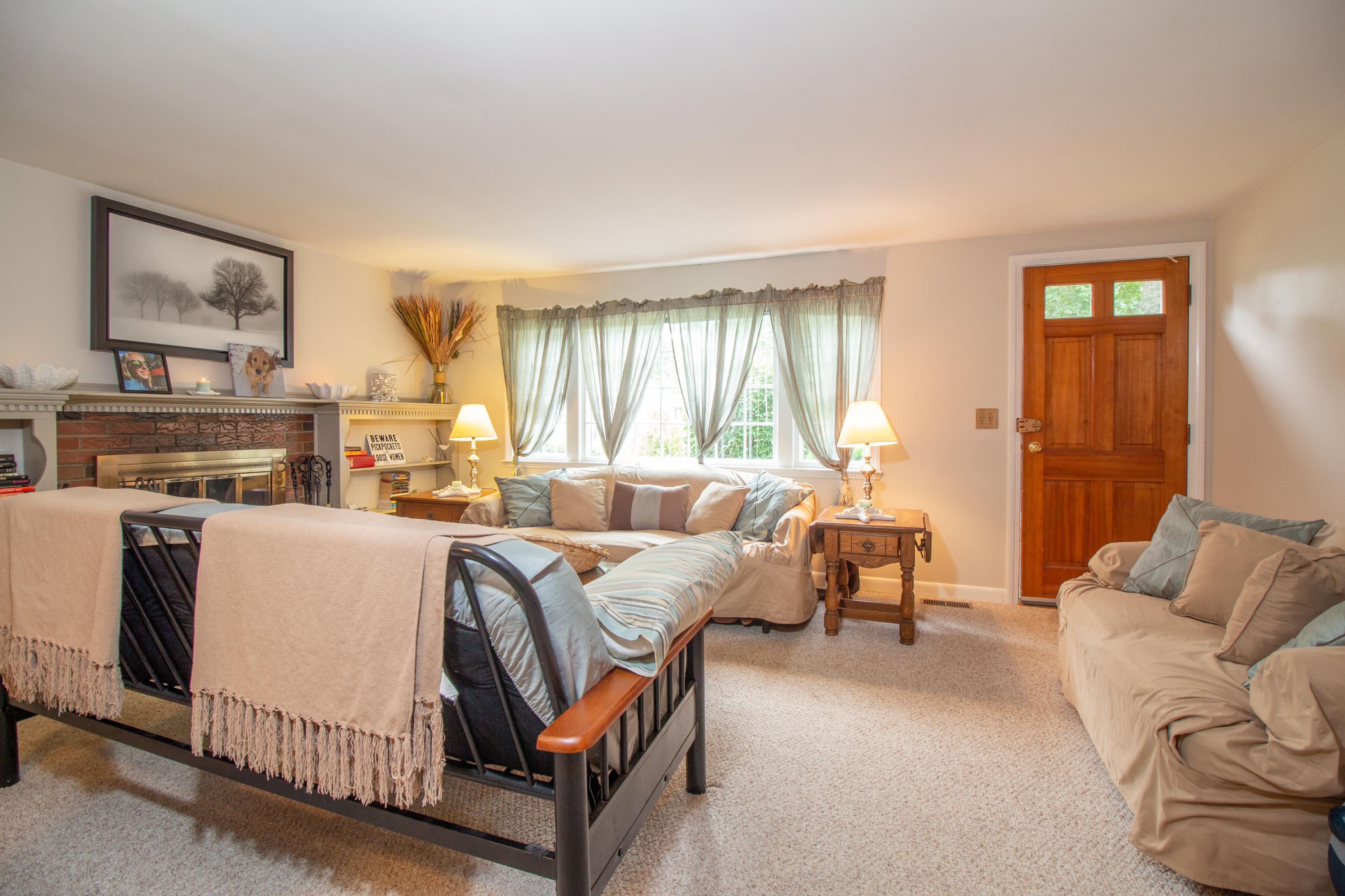 52 Farm Hill Road Centerville, MA 02632 - Photo 6 of 29 a living room with furniture a large window and a flat screen tv