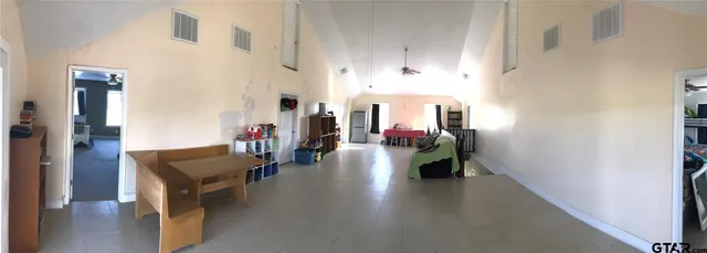 a hallway with wooden floor