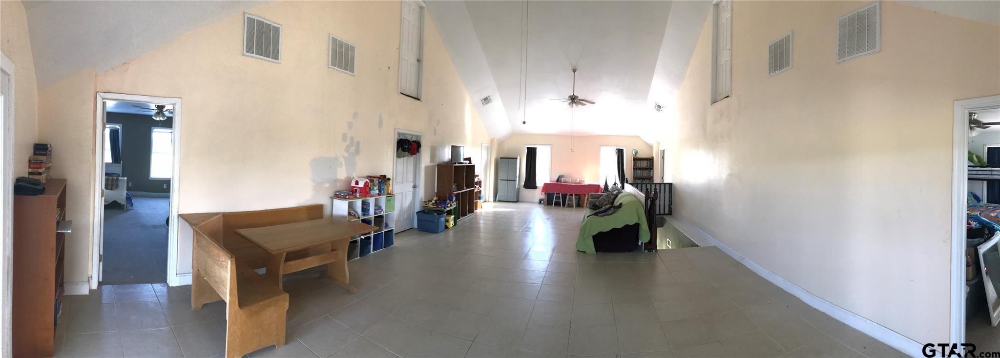1100 East Rabbit Cove Road Quinlan, TX 75474 - Photo 5 of 18 a hallway with wooden floor