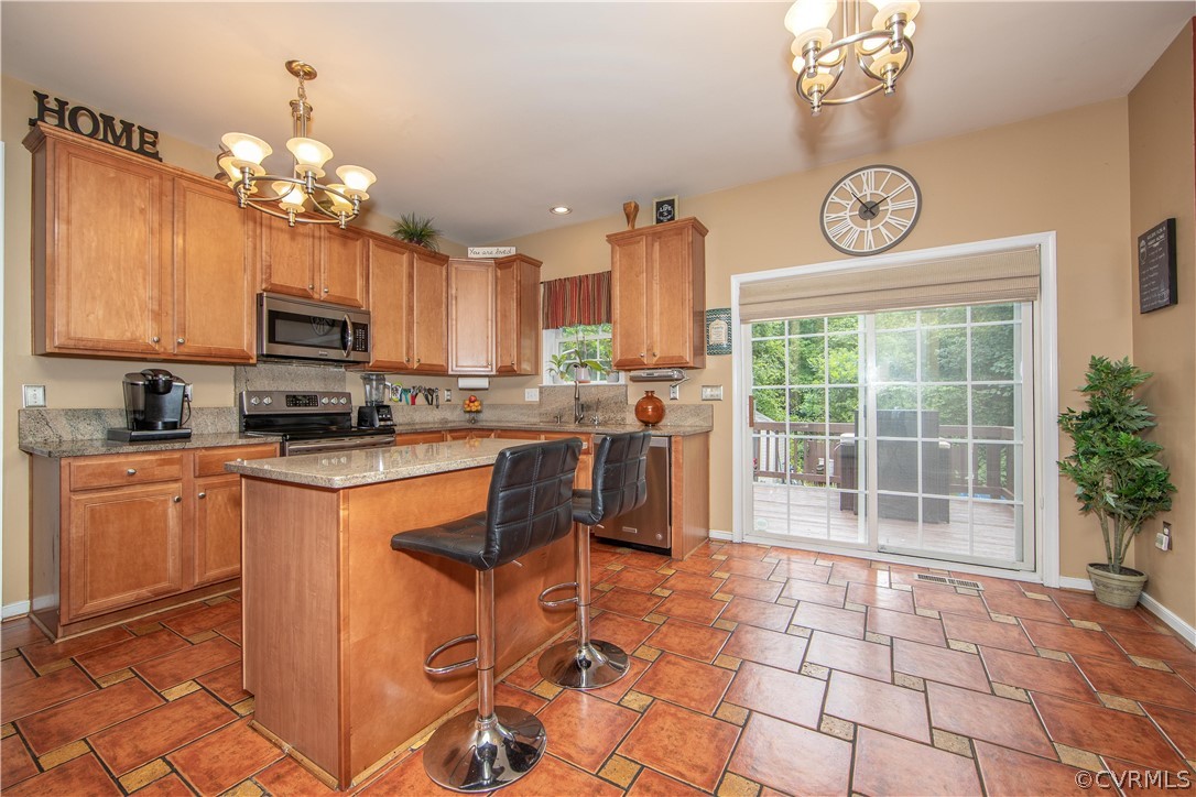5707 Springmount Road Chesterfield, VA 23832 - Photo 9 of 24 French doors open to 2-tiered deck.