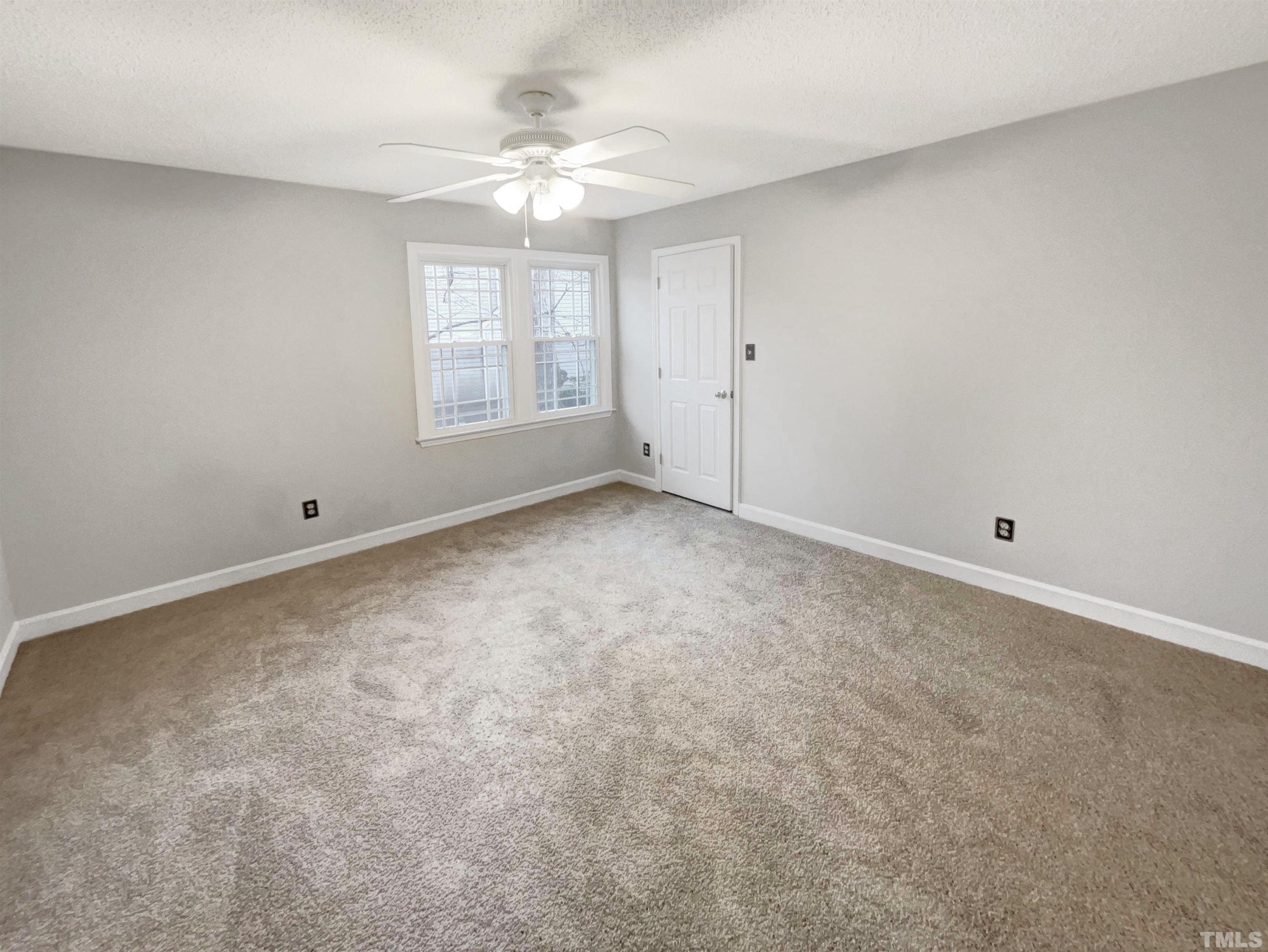 5109 Knightsbridge Way Raleigh, NC 27604 - Photo 15 of 20 a view of an empty room with a window