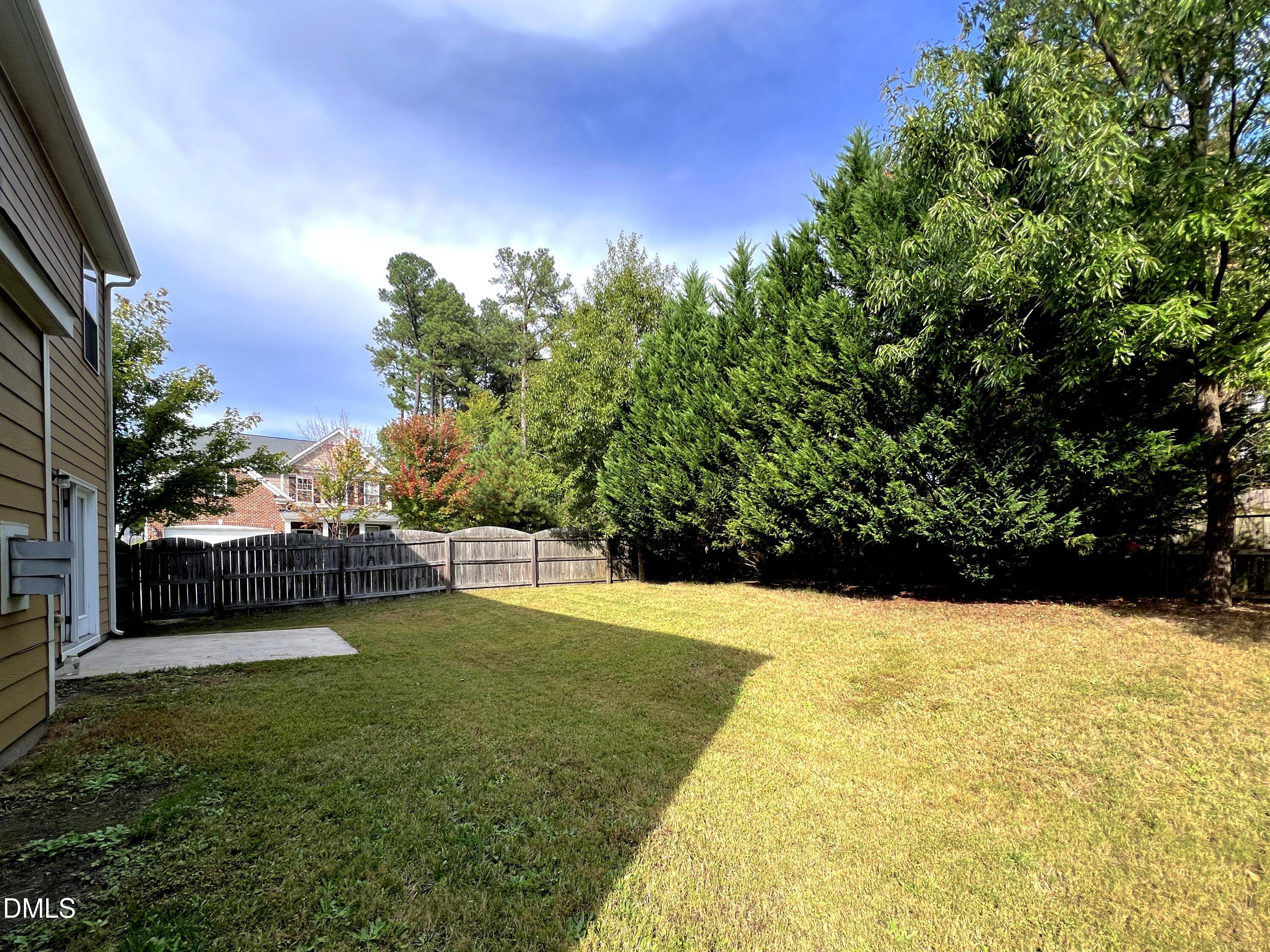 1495 Willowcrest Road Durham, NC 27703 - Photo 31 of 35 a view of yard with swimming pool and green space