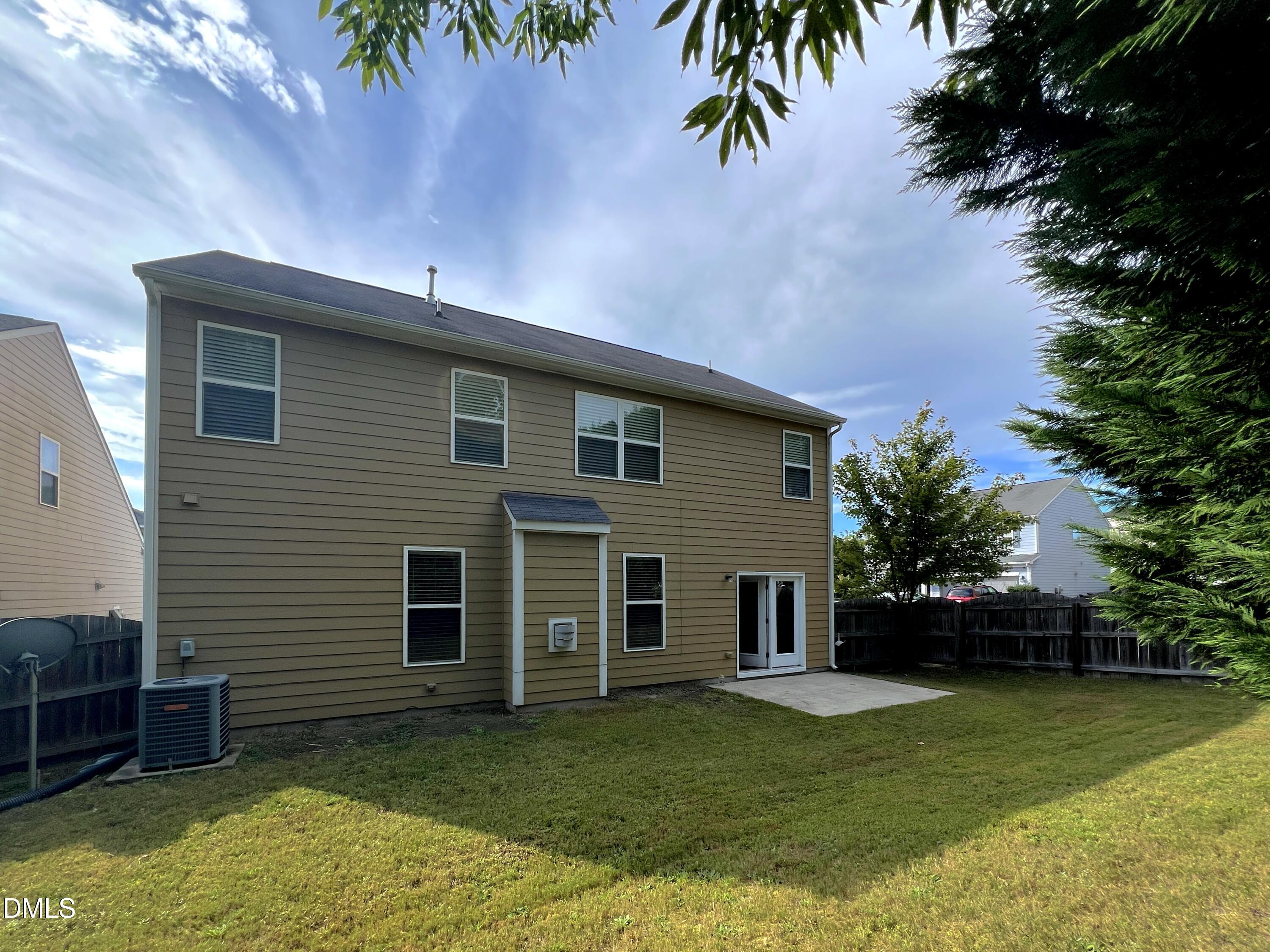 1495 Willowcrest Road Durham, NC 27703 - Photo 32 of 35 a backyard of a house with seating space