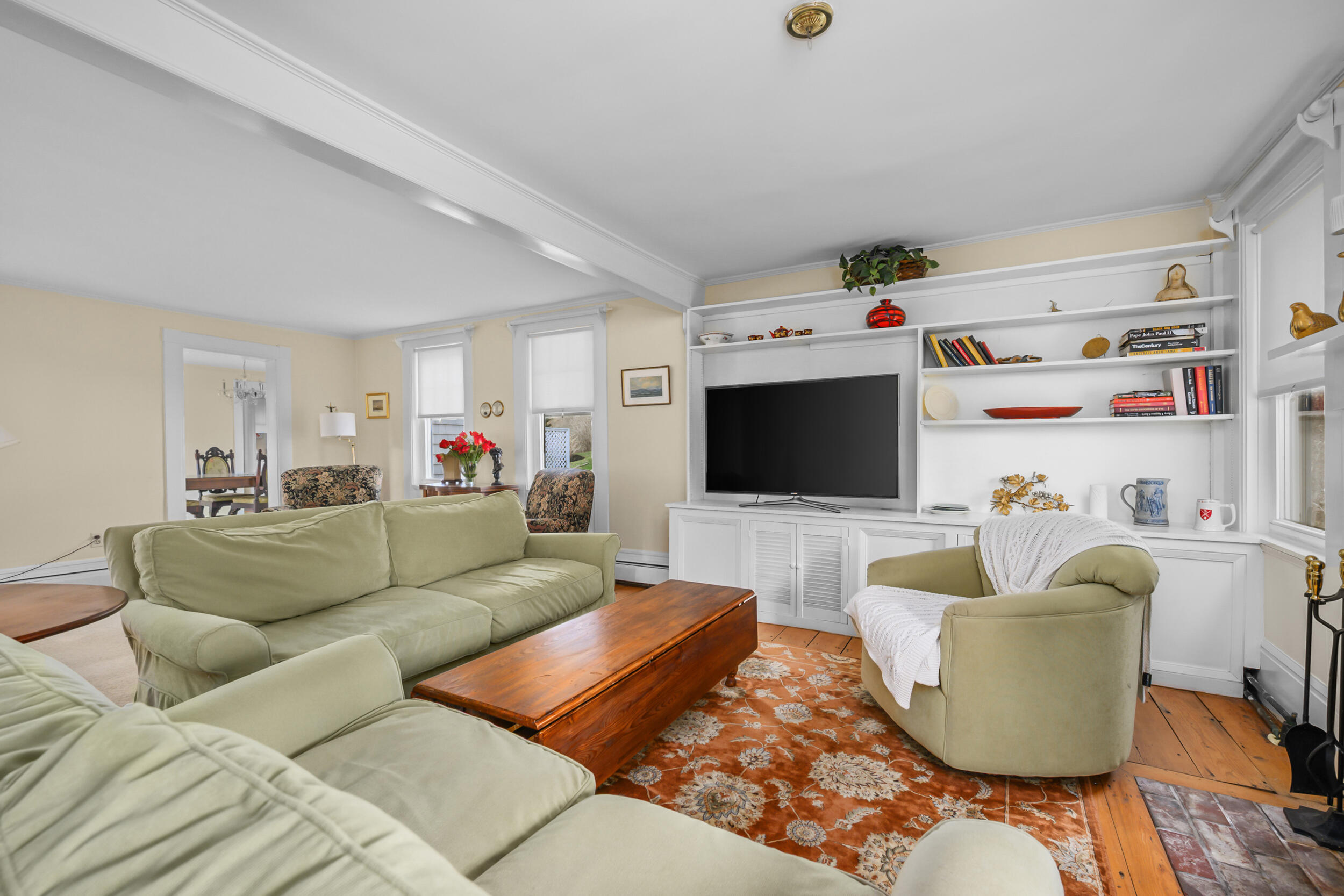 332 South Orleans Road Orleans, MA 02653 - Photo 6 of 42 a living room with furniture and a flat screen tv