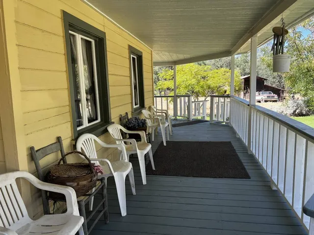 a view of a terrace with a lake view