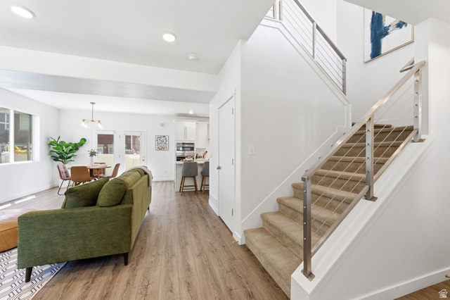 4595 College Ridge Court Millcreek, UT 84117 - Photo 5 of 57 Modern staircase with cable railing system and carpeted treads