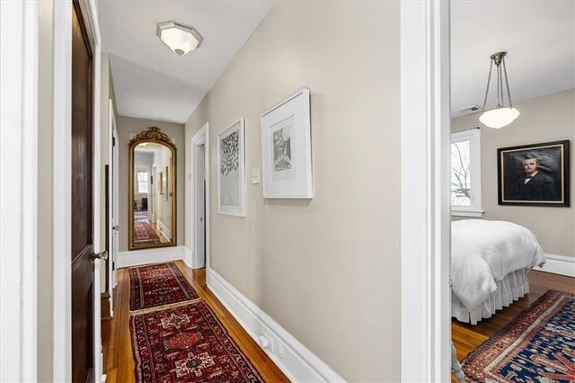 a front view of a house with wooden floor