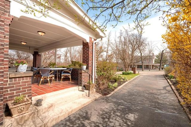 a view of a patio with a yard