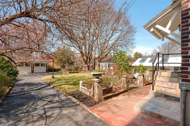 a view of a yard with trees