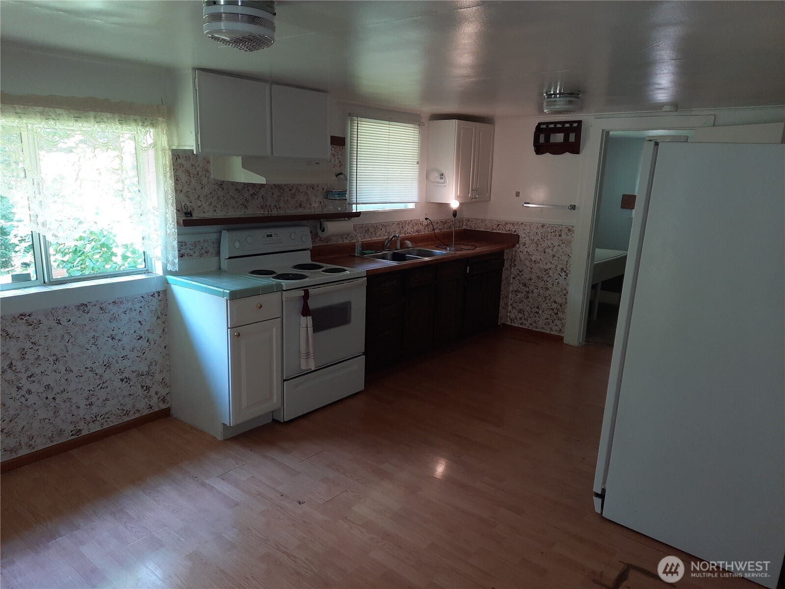 57255 State Rte 20 Rockport, WA 98283 - Photo 14 of 33 a kitchen with stainless steel appliances granite countertop a stove a sink and a refrigerator