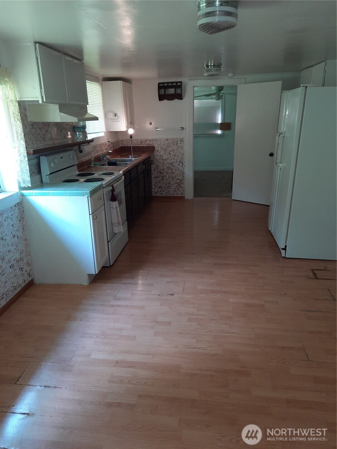 57255 State Rte 20 Rockport, WA 98283 - Photo 18 of 33 a kitchen with stainless steel appliances granite countertop a stove a sink and a refrigerator