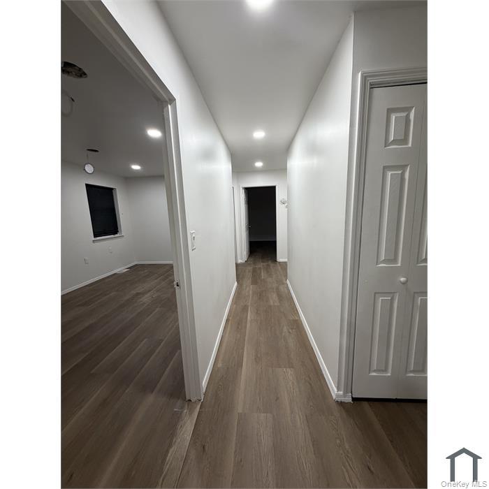 803 Jackson Avenue, Unit A Bronx, NY 10456 - Photo 7 of 8 a view of hallway with wooden floor
