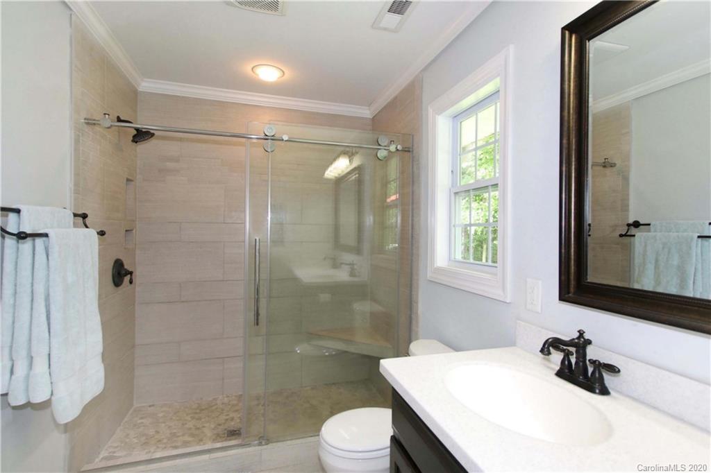 200 McCrary Road Mooresville, NC 28117 - Photo 13 of 41 a bathroom with a sink toilet and shower
