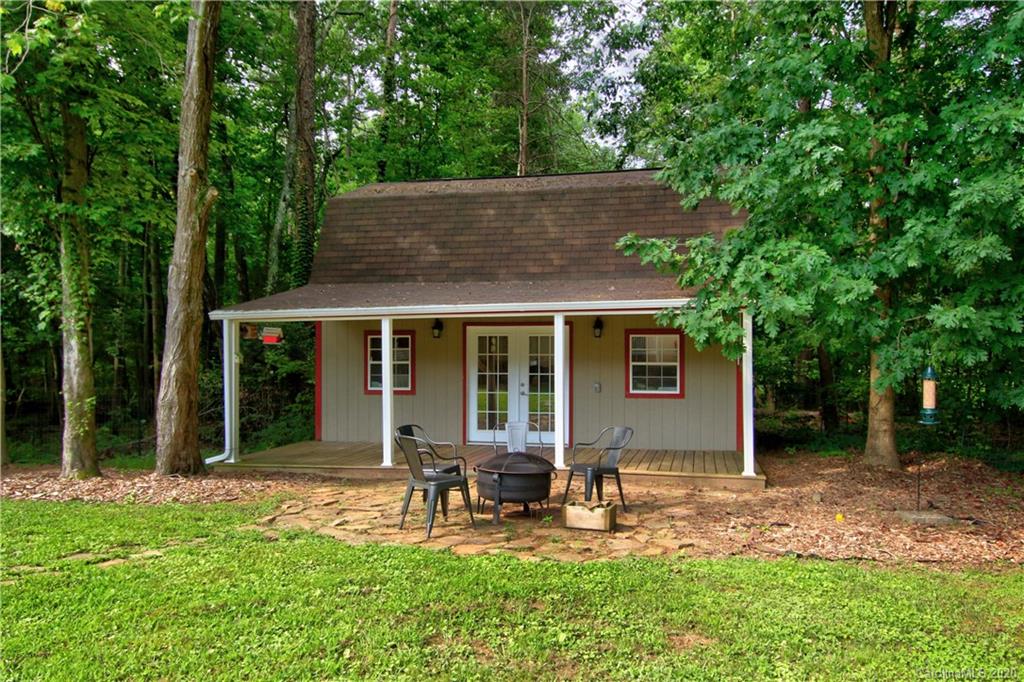 200 McCrary Road Mooresville, NC 28117 - Photo 23 of 41 a backyard of a house with yard table and chairs