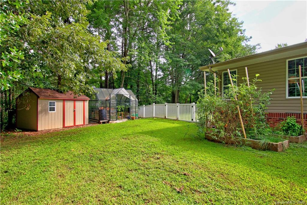 200 McCrary Road Mooresville, NC 28117 - Photo 31 of 41 a view of a house with backyard and garden