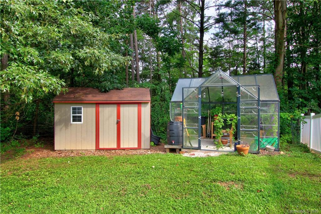 200 McCrary Road Mooresville, NC 28117 - Photo 32 of 41 a view of a house with backyard and a tree