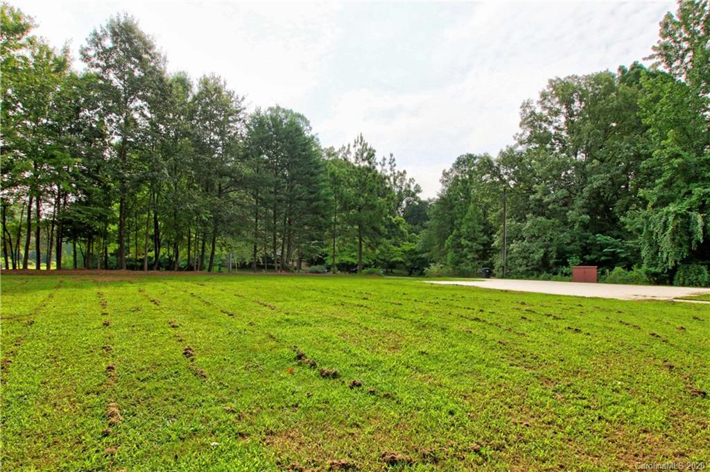 200 McCrary Road Mooresville, NC 28117 - Photo 38 of 41 a view of a field with a tree