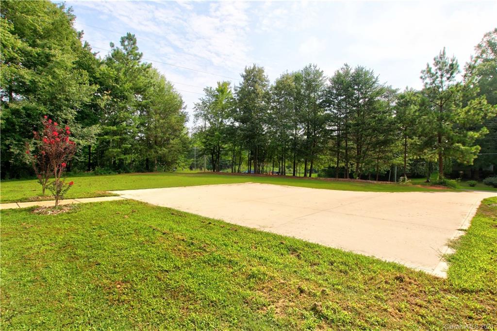 200 McCrary Road Mooresville, NC 28117 - Photo 39 of 41 a view of a swimming pool with a small yard