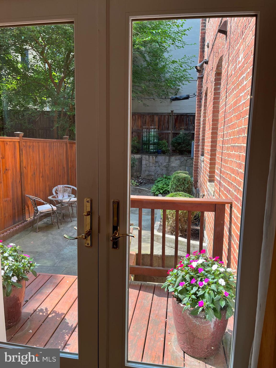2127 Leroy Place Northwest Washington, DC 20008 - Photo 15 of 51 a view of a balcony with chair and potted plants