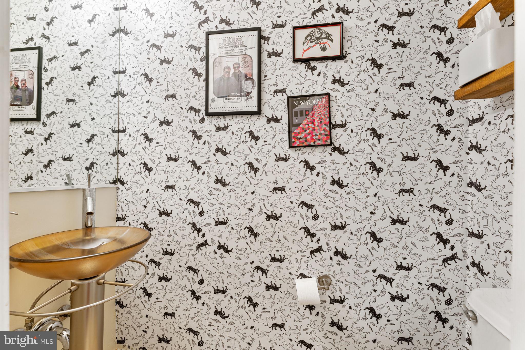 1105 Park Road Northwest, Unit 3 Washington, DC 20010 - Photo 10 of 20 a bath room with a sink and a mirror