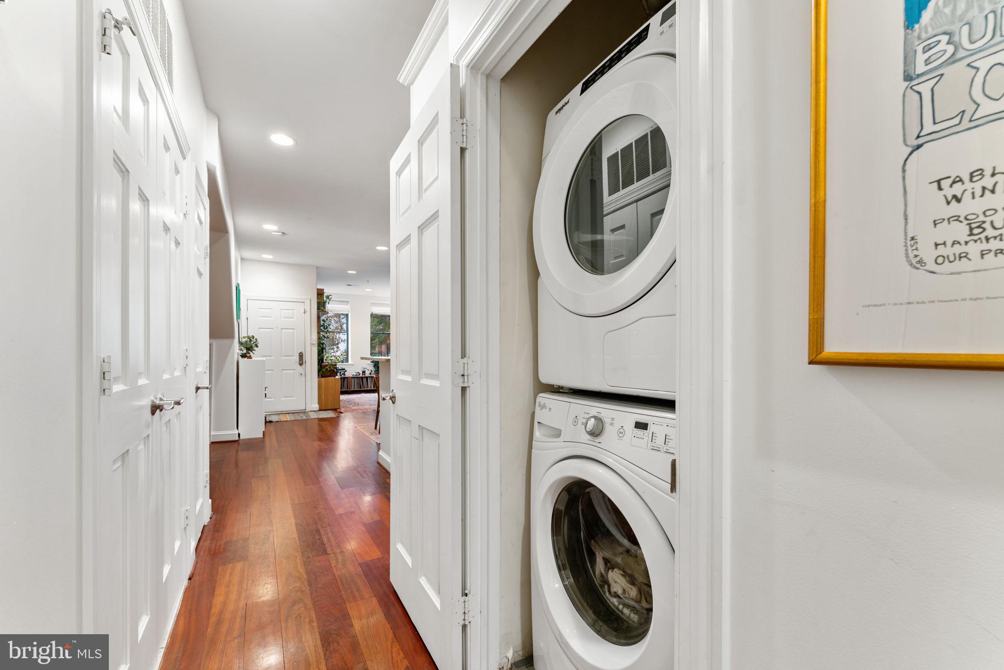 1105 Park Road Northwest, Unit 3 Washington, DC 20010 - Photo 11 of 20 a view of a hallway with washer and dryer