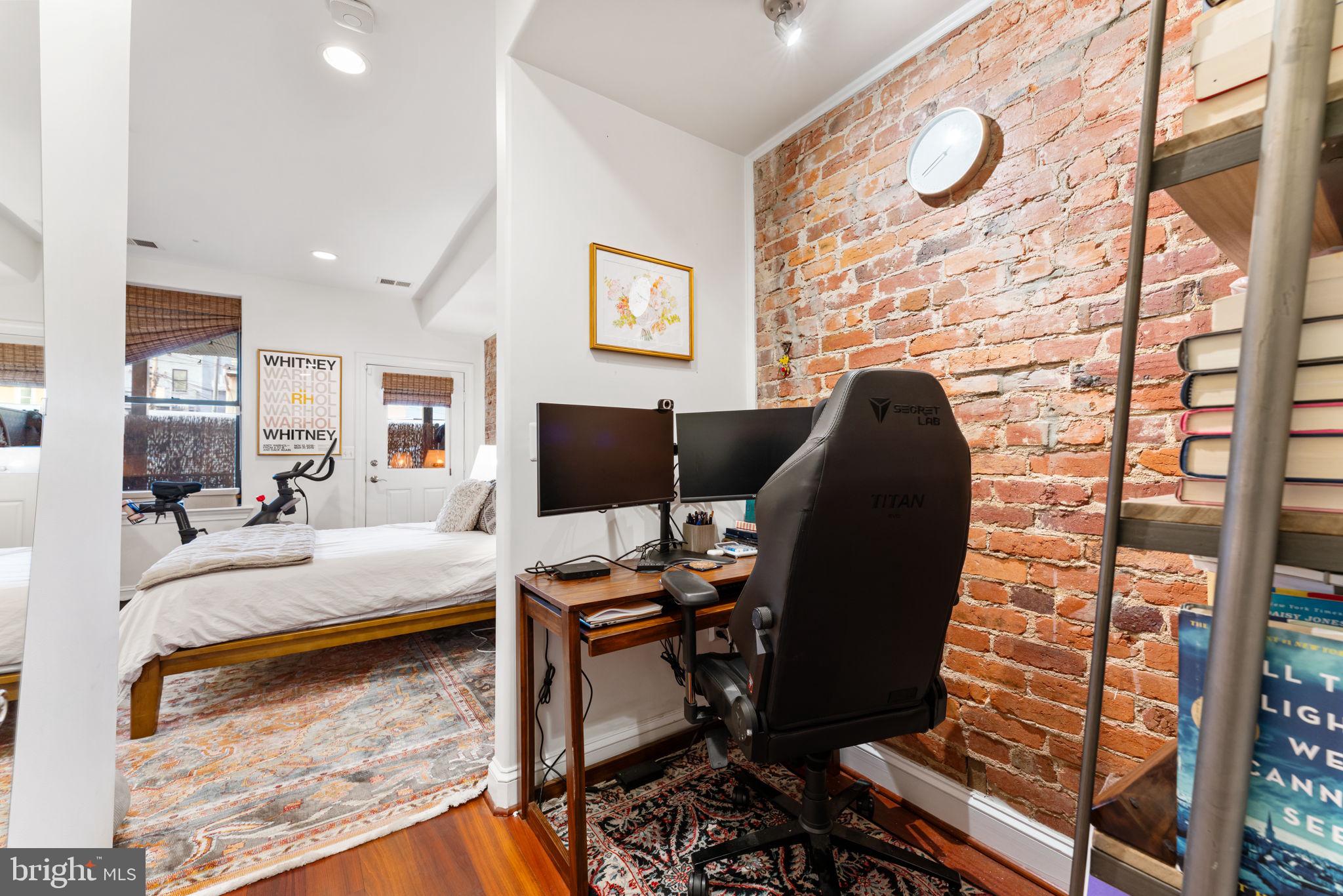 1105 Park Road Northwest, Unit 3 Washington, DC 20010 - Photo 15 of 20 a view of a workspace with furniture and a window